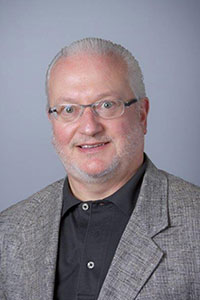 Dr. Carl E. Nuesch